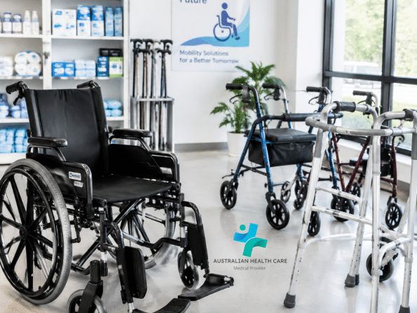 Four-wheel rollator walker with handles, brakes and a seat for mobility assistance.